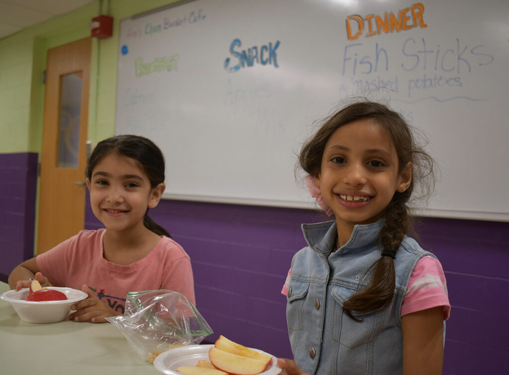 girls eating snack